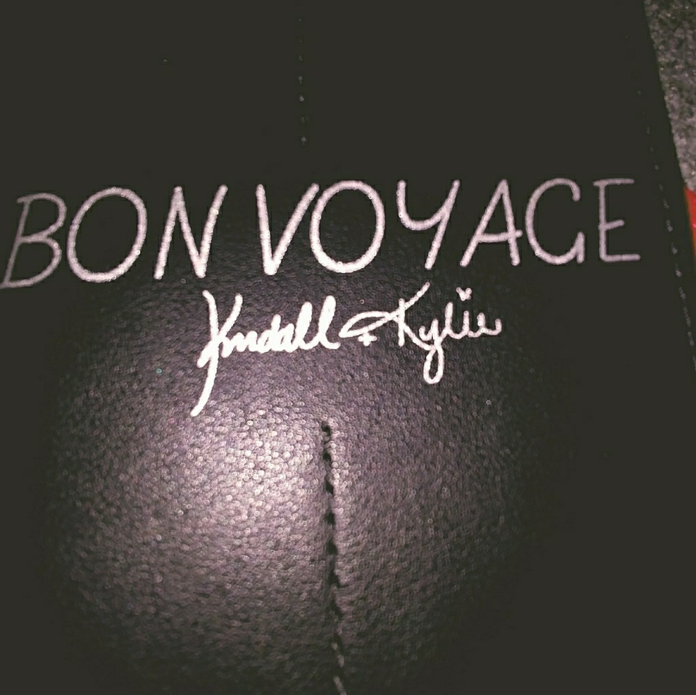 This is a Kyle and Kendall Passport Wallet